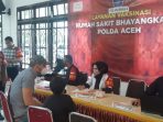 Suasana dalam giat vaksinasi di Polda Aceh